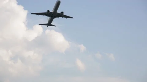 Plane taking off against clouds Stock Footage 65218631