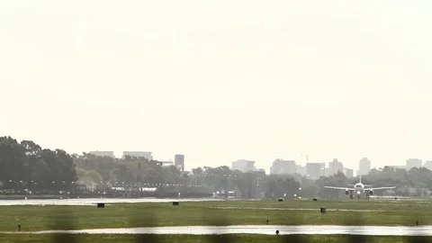Plane taking off at the airport Stock Footage 77609767