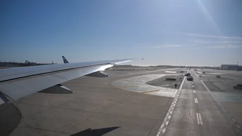Plane taking off from airport Stock Footage 106601926