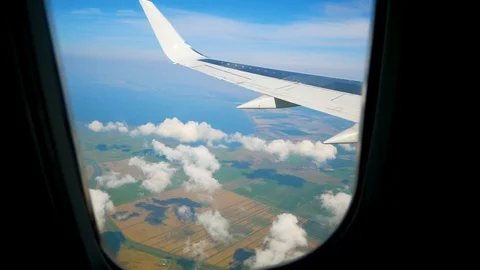 Plane taking off from airport, View through an airplane window Stock Footage 113095948