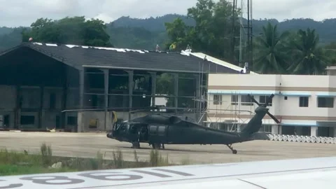 Plane taking off and chopper in view Stock Footage 197090803