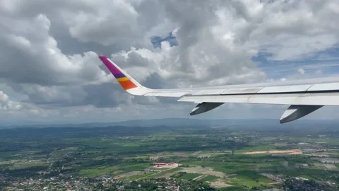 Plane taking off and flying to the clouds 스톡 동영상 287598582