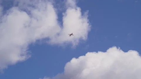 Plane taking off and flying through clouds Stock Footage 275520836