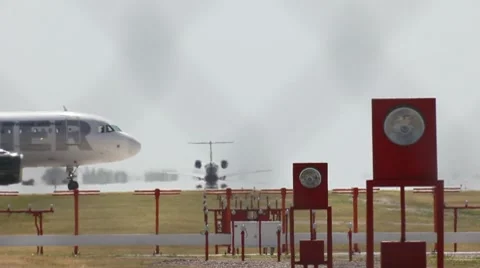 Plane Taking Off, Another Waiting Stock Footage 8695114