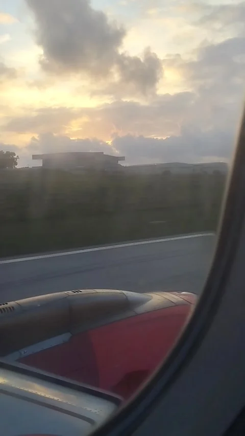 Plane taking off during sunset. Video stock 281835755