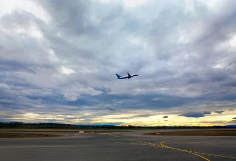 The plane is taking off Stock Photos