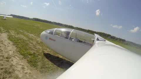 Plane taking off with a pilot in cabin aerial video Stock Footage 109055852