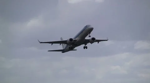 Plane taking off on runway Stock Footage