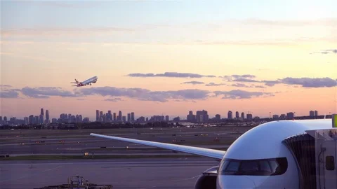 Plane taking off at sunset Stock Footage 118608277