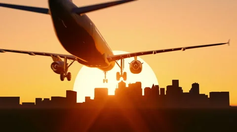Plane taking off on sunset or sunrise Stock Footage 40843419