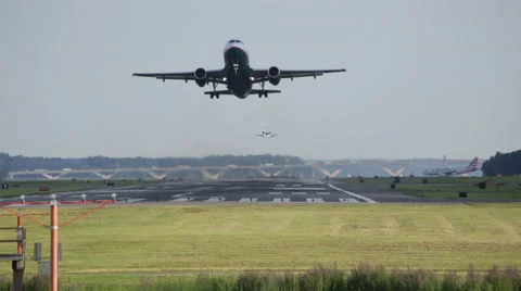 Plane taking off towards camera at DCA Ronald Reagan Washington National Airport Stock Footage 65218623