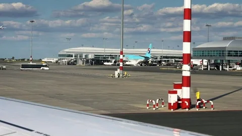 The plane is taking off. View from  window of the aircraft waiting to be towed Stock Footage 85244526