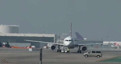 Plane on Tarmac at LAX Stock Footage 55276990