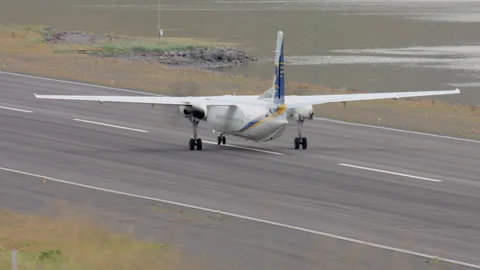 Plane taxis away down runway Isafjordur WestFjords Iceland Stock-Footage 166973559