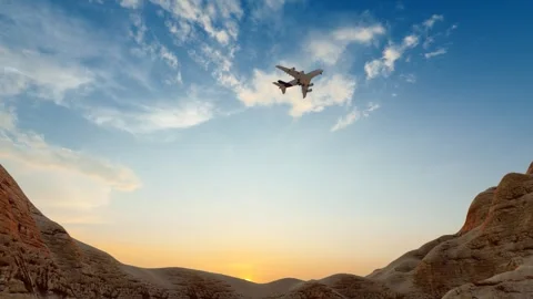 The plane took off and flew over the desert Video stock 332043137