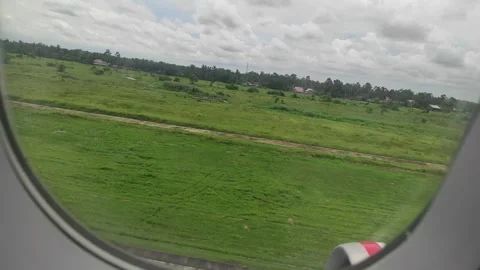 Plane touching down the land Stock Footage 268106587