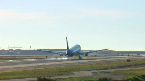 Plane touching down at LAX Stock Footage 740442
