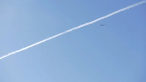 Plane with trace in the sky Stock Footage 114246861