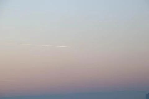 The plane trance on a sky. Stock Photos
