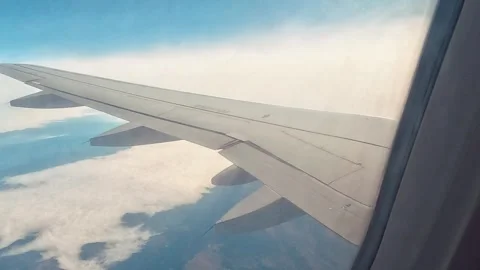 Plane Travel Sky Window Wings Clouds Earth Background Stock Footage 339969382