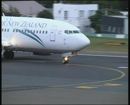 Plane turning off runway Stock Footage 139960