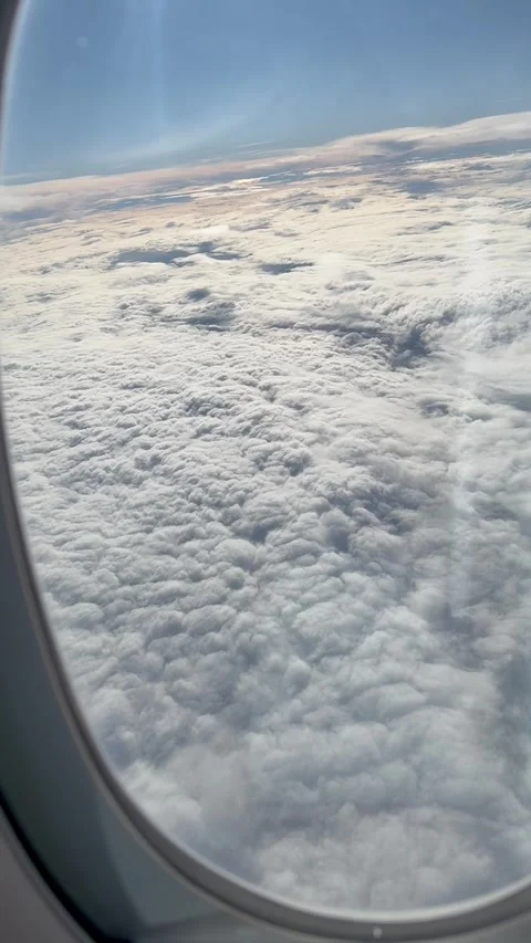 Plane view over clouds Stock Footage 322042561
