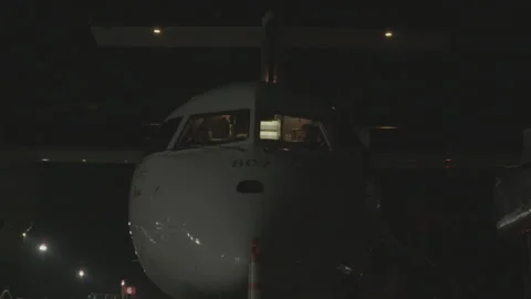 Plane Waiting to Takeoff at Night Stock Footage 154004260