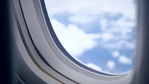 Plane window aerial view Stock Footage 77753510