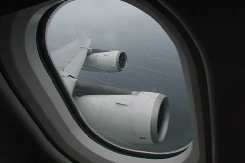 Plane window during storm 1 Stock Footage 490495
