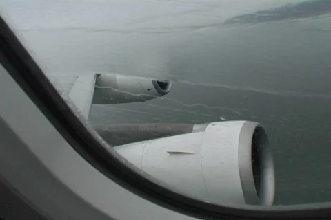Plane window during storm 2 Stock Footage 490498