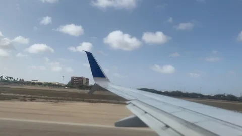Plane Window Takeoff Timelapse Stock Footage 129053033