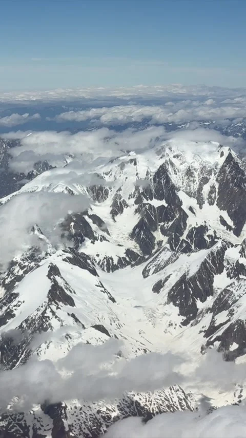 Plane Window View Over Snowy Alps Mountain Range 스톡 동영상 336954834