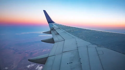 Plane Wing Aerial View During Sunset Stock Footage 64815714