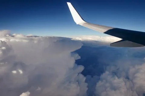 Plane wing during flight Stock Photos