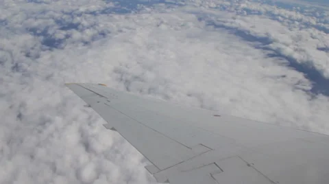 Plane Wing Flying Over Land and Clouds 004 Stock Footage 38223084