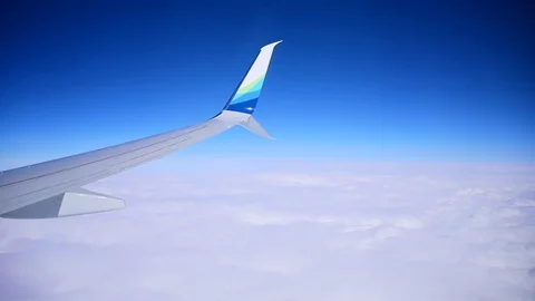 Plane wing over white thick cloud Stock Footage 80896446