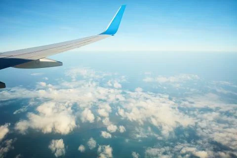 Plane wing in the sky 写真素材