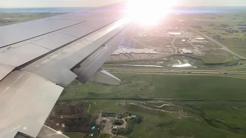 Plane Wing Sunlight Lens Flare Reflection Air Flight Transport Atmosphere Stock Footage 121175929