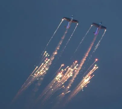 Planes with fireworks Stock Photos