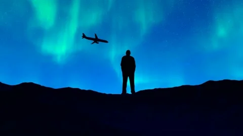 Planes fly over the heads of people looking up at the stars Stock Footage 288172799