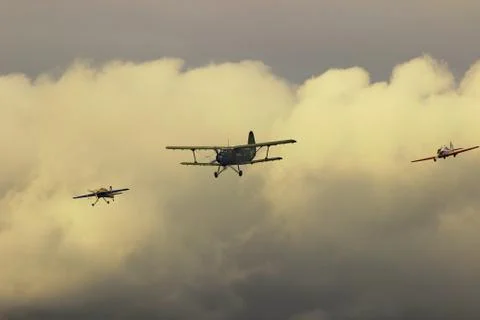 Planes flying from the clouds Stock Photos