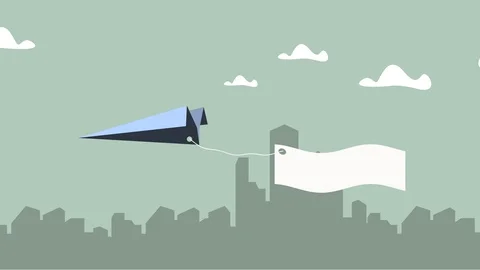 Planes flying in the sky , planes dragging advertisement label above the city  Stock Footage 120352193