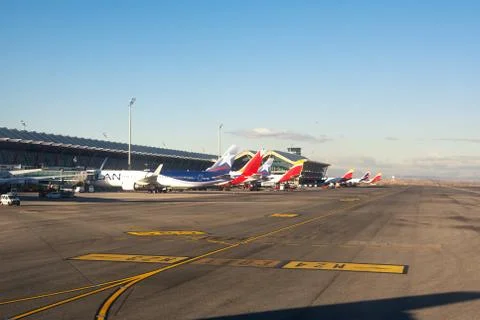 Planes parked for loading passengers Stock Photos