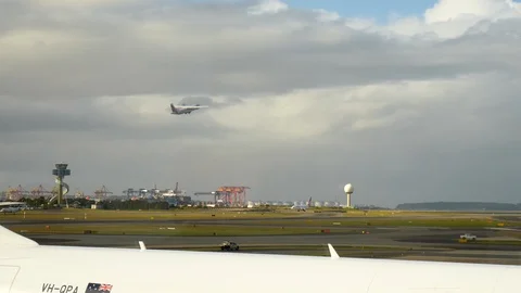 Planes from Qantas Airways (QF) at Sydney's Kingsford Smith airport (SYD) Stock Footage 90311507