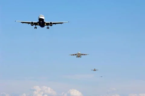 Planes ready to land Stock Photos