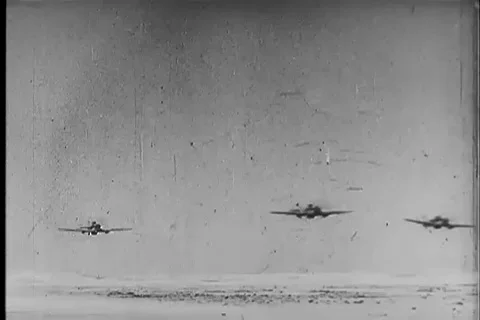 Planes takeoff and strafe German tanks in North Africa - 1943 Video stock 102181558