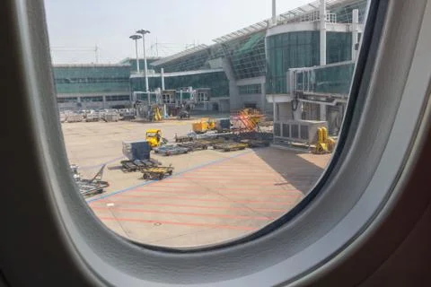 Plane's window before taking off Foto stock