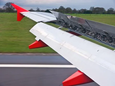 Planes wing flaps open Stock Photos