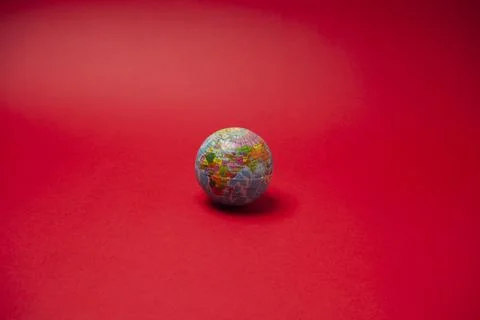A planet ball in a red background Stock Photos