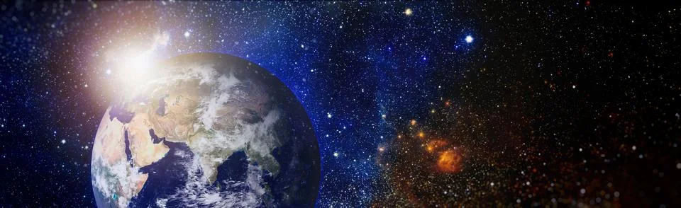 Planet Earth in the Starry Sky. Elements of this image furnished by NASA Stock Photos